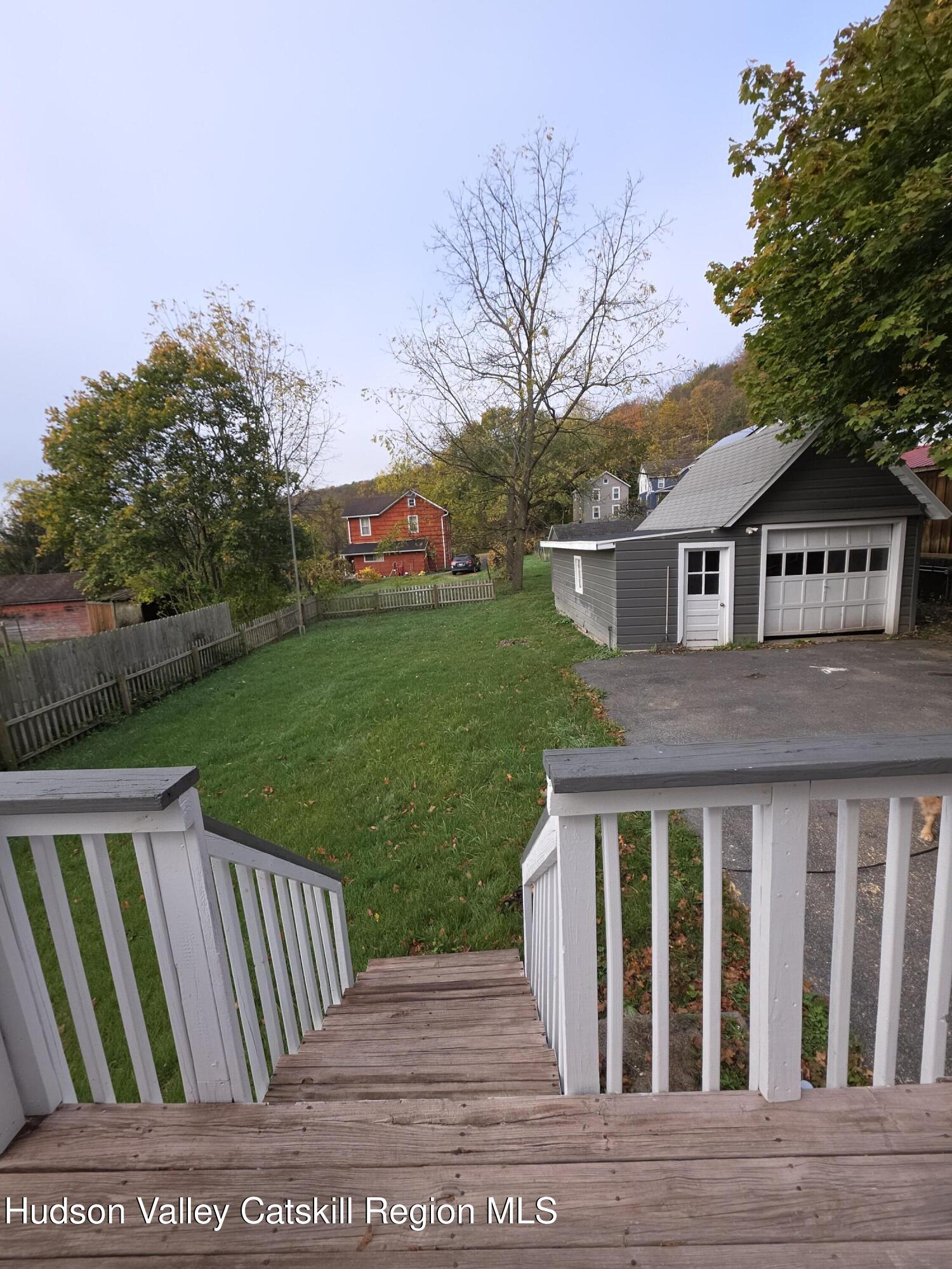 22 Maple Street Catskill, NY 12414 - Photo 16 of 16 a front view of a house with garden