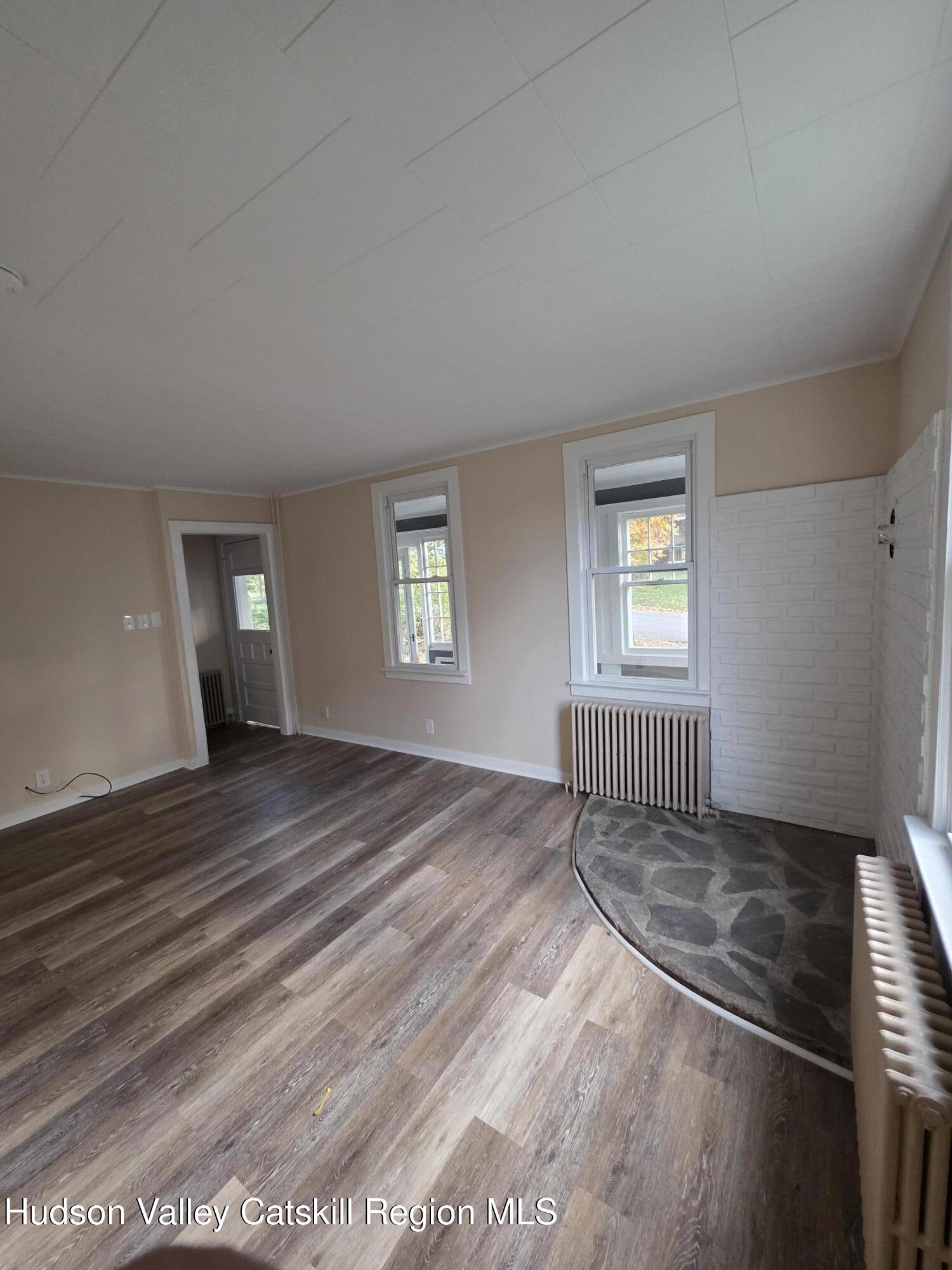 22 Maple Street Catskill, NY 12414 - Photo 5 of 16 a view of a livingroom with a window