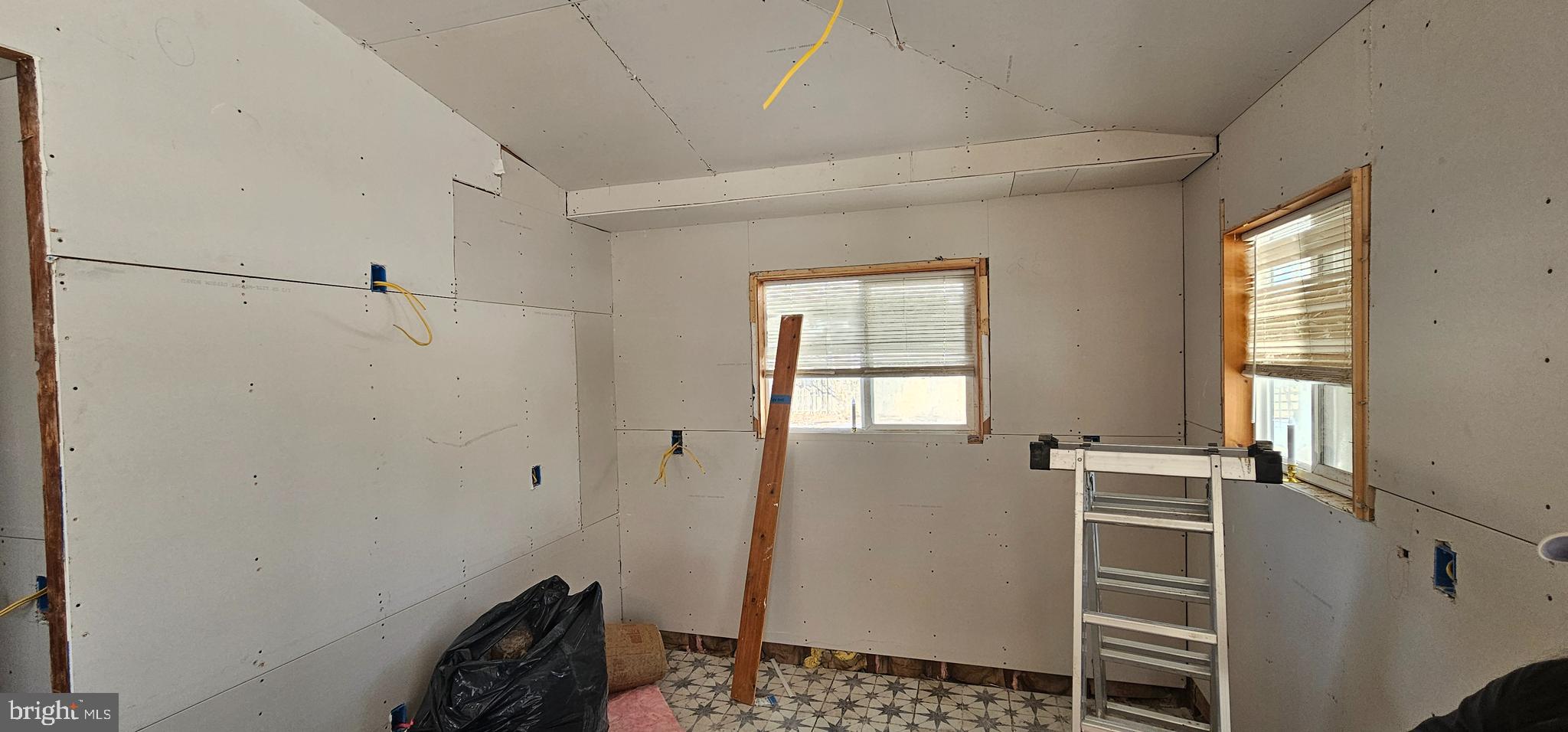 1794 Main Street Port Norris, NJ 08349 - Photo 15 of 41 a view of hallway with window and wooden floor