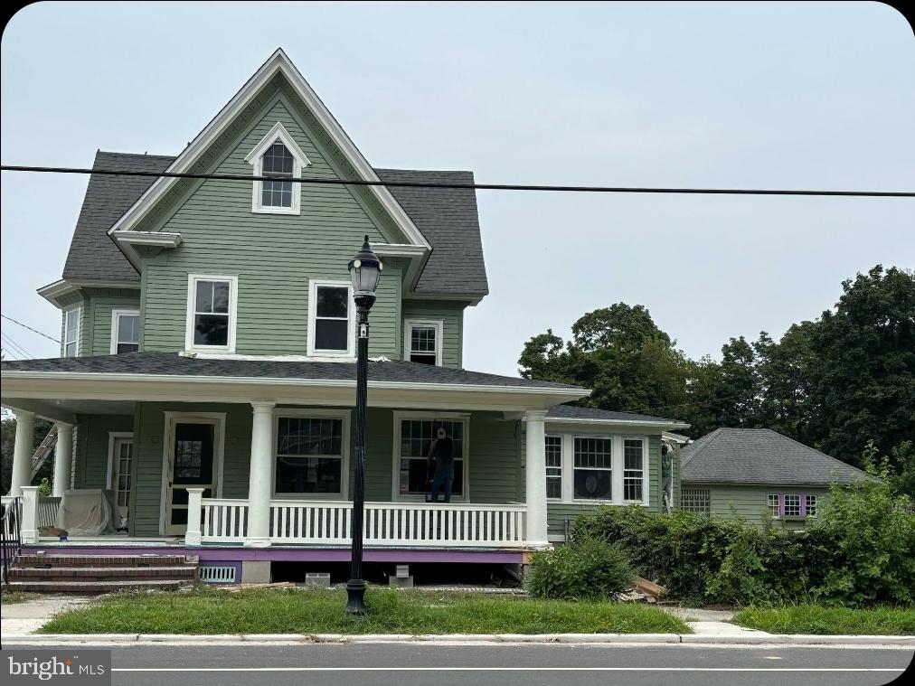 1794 Main Street Port Norris, NJ 08349 - Photo 2 of 41 a front view of a house with a yard