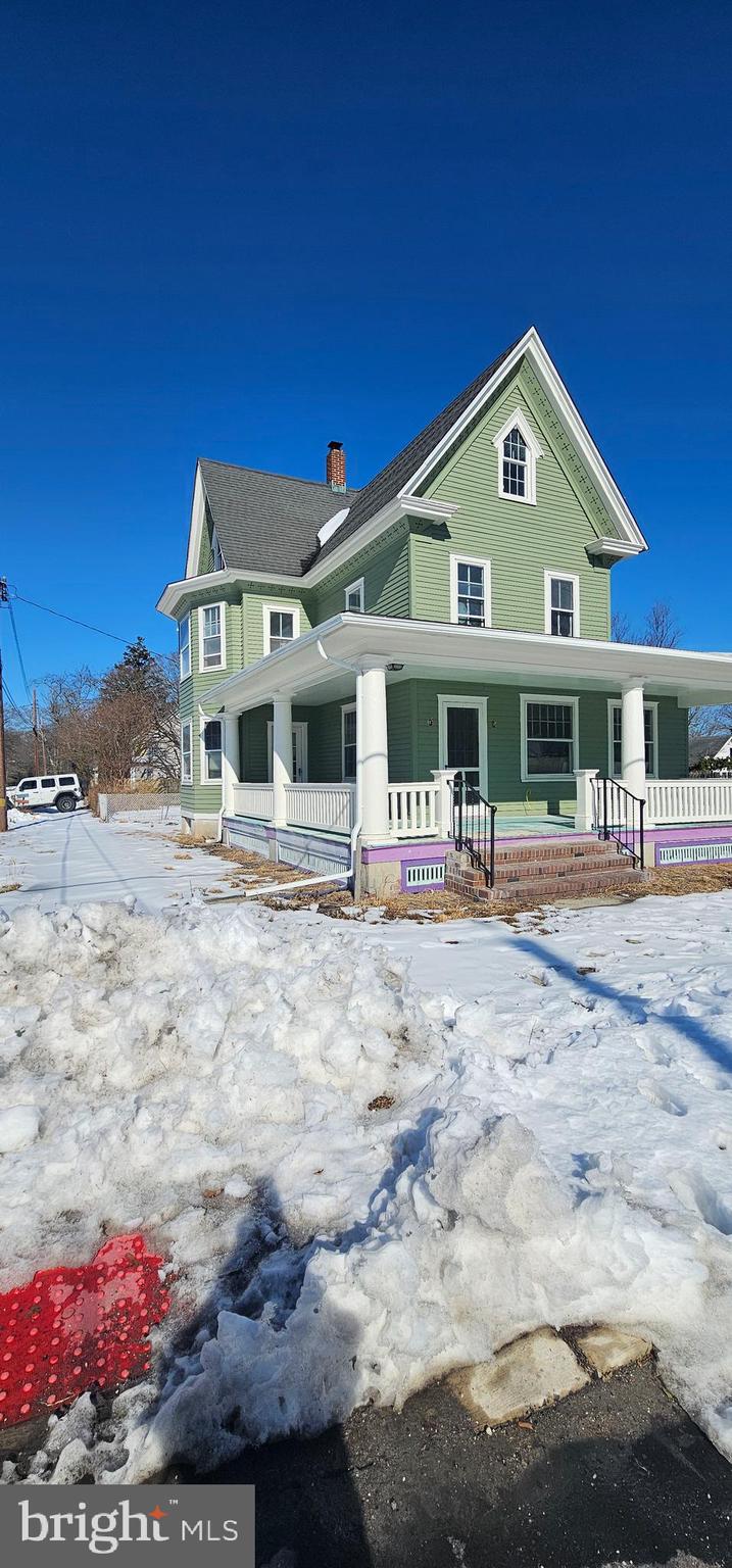 1794 Main Street Port Norris, NJ 08349 - Photo 3 of 41 a front view of a building with many windows