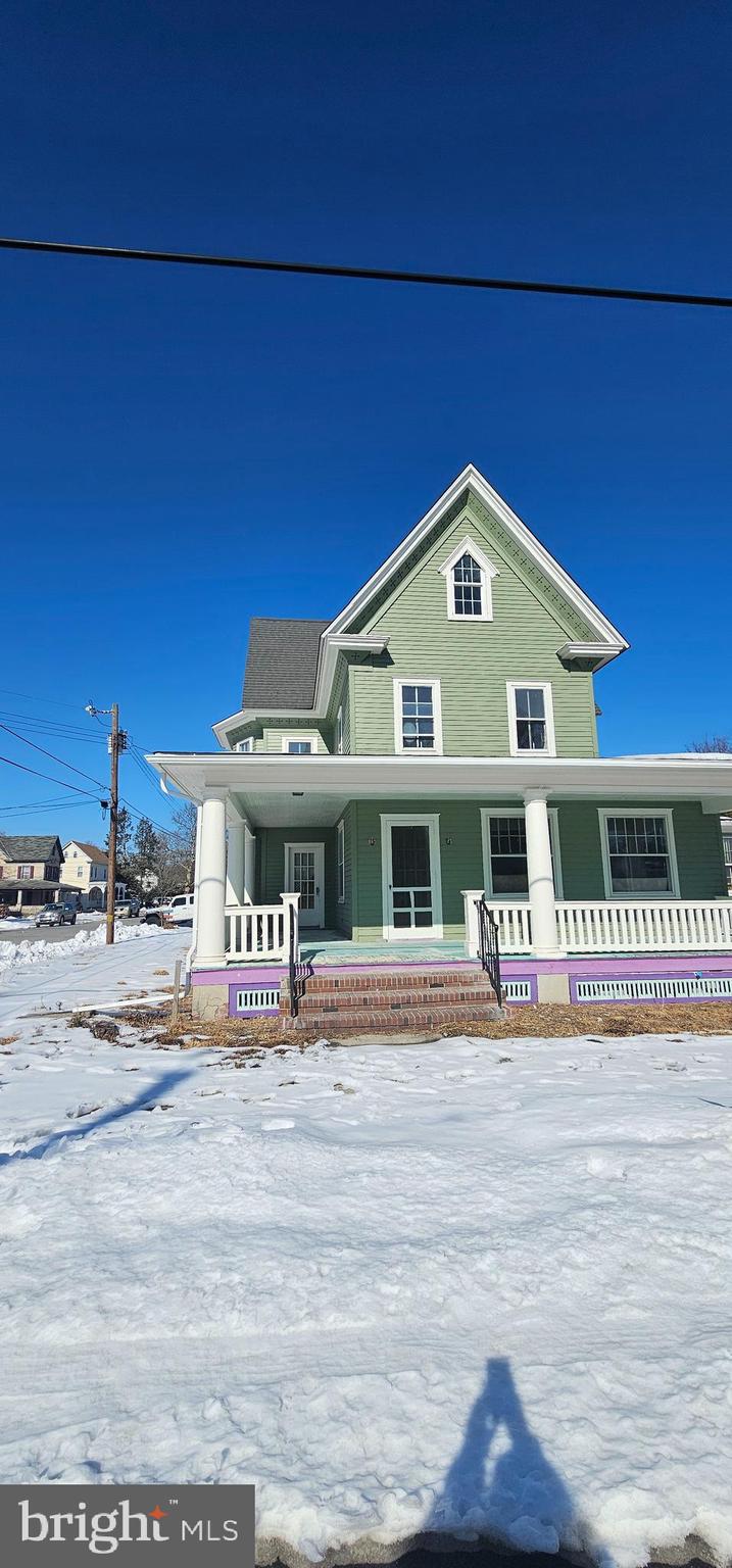 1794 Main Street Port Norris, NJ 08349 - Photo 4 of 41 a front view of a house with a yard