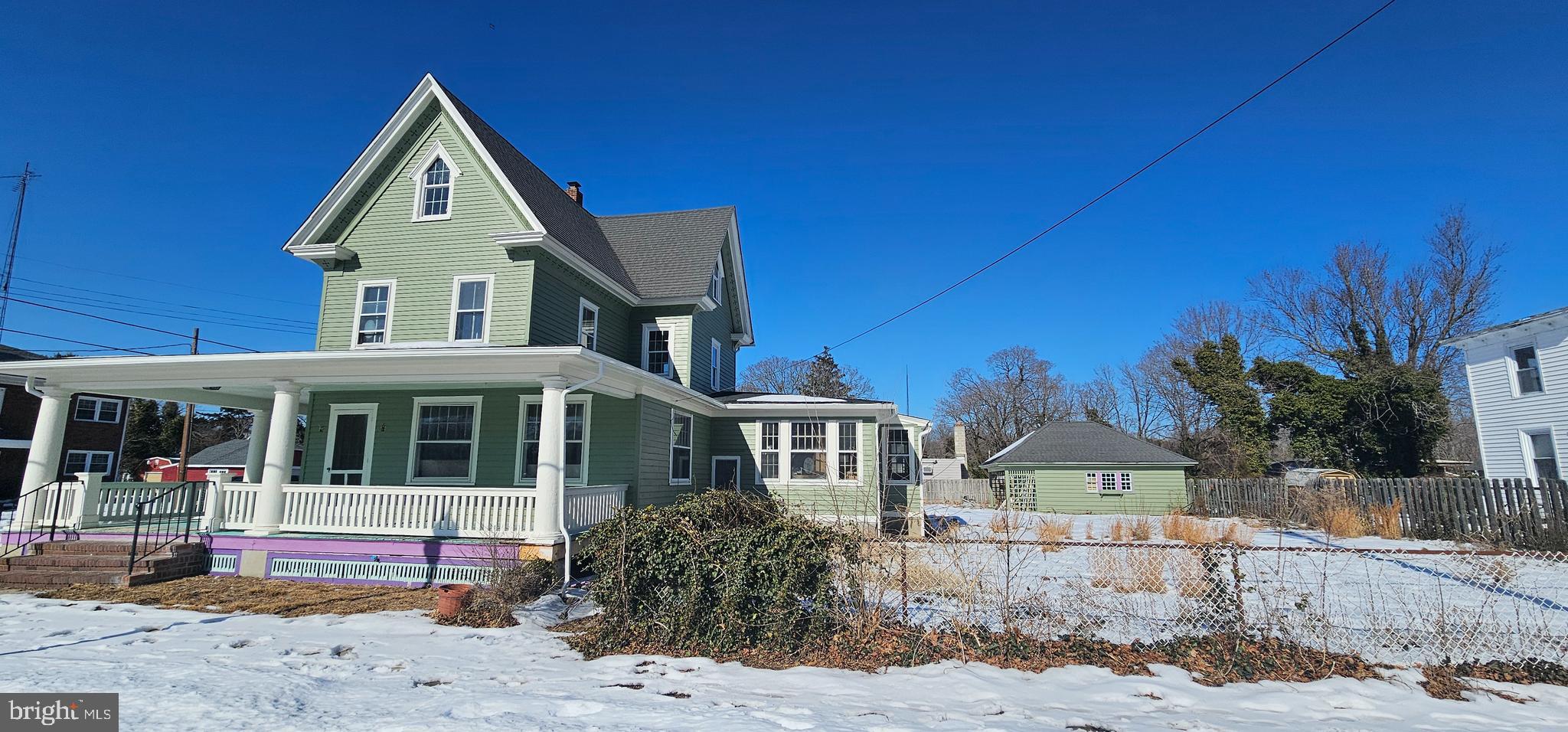1794 Main Street Port Norris, NJ 08349 - Photo 5 of 41 a front view of a house with a yard