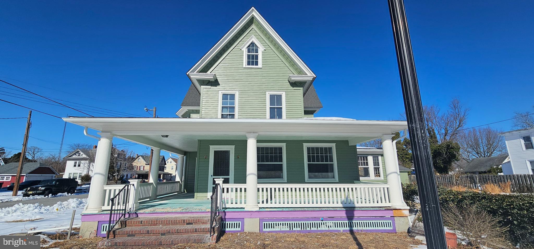 1794 Main Street Port Norris, NJ 08349 - Photo 8 of 41 a front view of a house with a porch