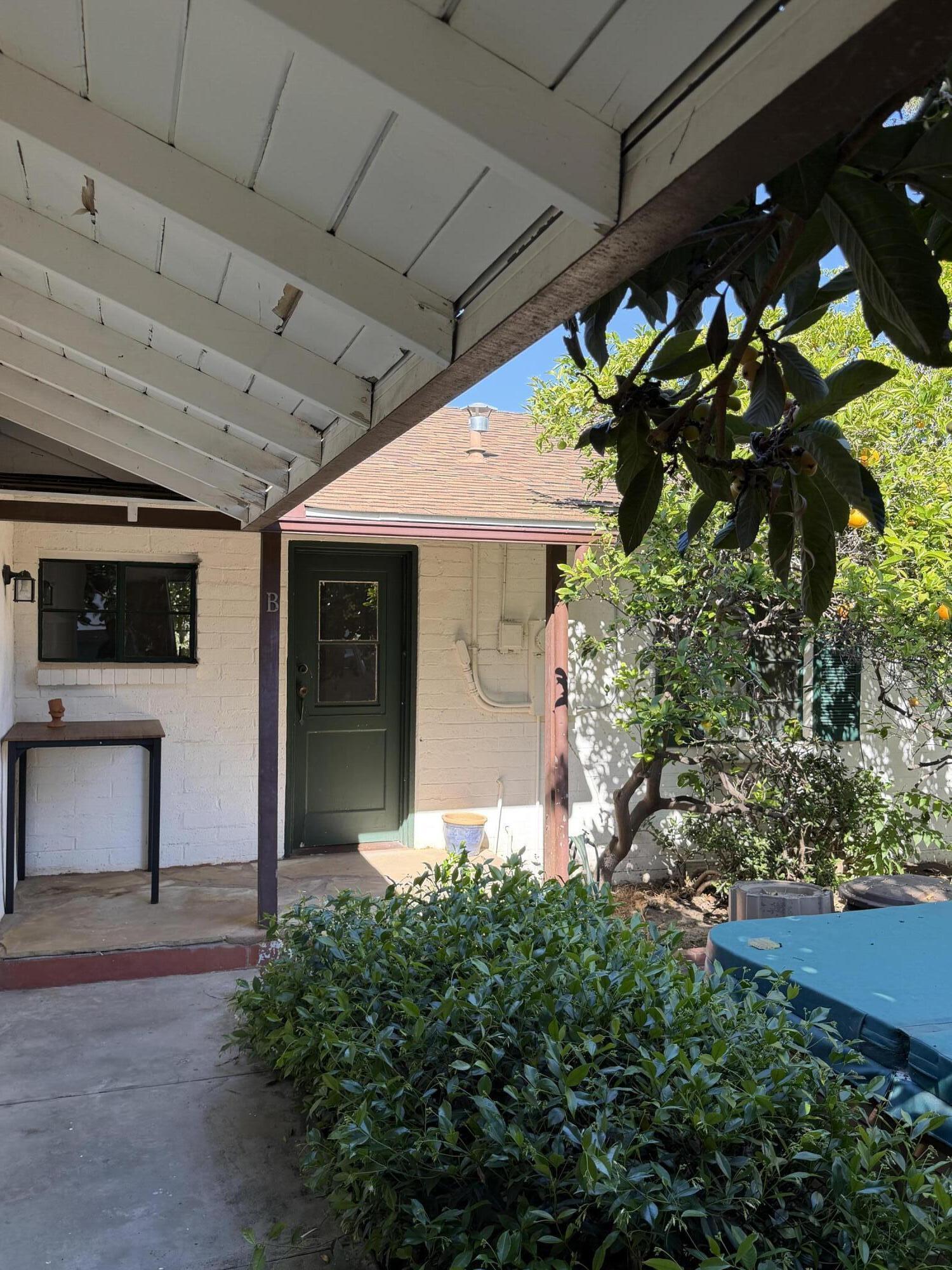 316 Oceano Avenue, Unit B Santa Barbara, CA 93109 - Photo 2 of 17 a front view of a house with a large tree