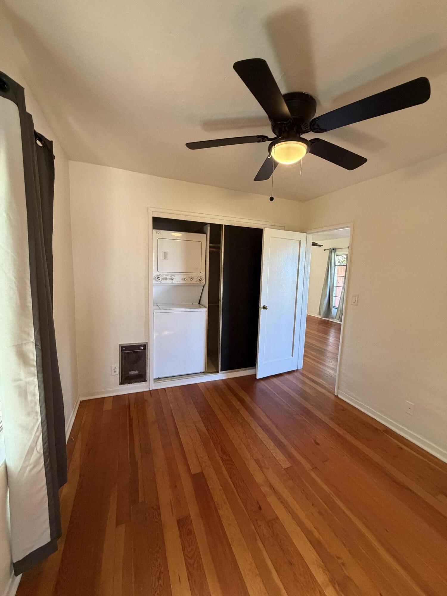 316 Oceano Avenue, Unit B Santa Barbara, CA 93109 - Photo 9 of 17 a view of empty room with wooden floor and fan