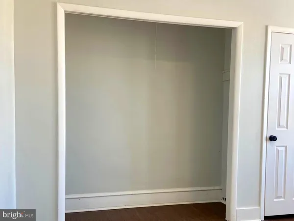 a patio with table and chairs