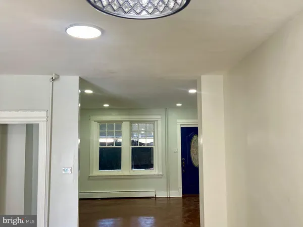 a view of a kitchen with a window