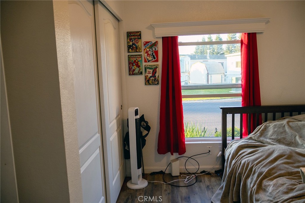 2499 East Gerard, Unit 123 Merced, CA 95341 - Photo 14 of 15 a view of walk in closet with clothes and shoes