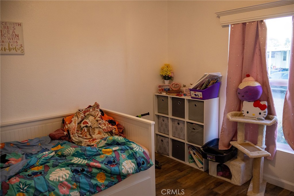 2499 East Gerard, Unit 123 Merced, CA 95341 - Photo 15 of 15 a room with furniture and a window