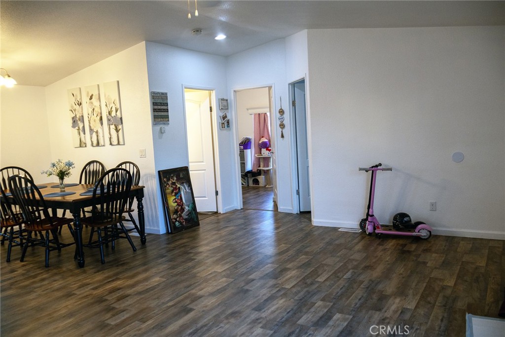 2499 East Gerard, Unit 123 Merced, CA 95341 - Photo 7 of 15 a view of a room with furniture and wooden floor