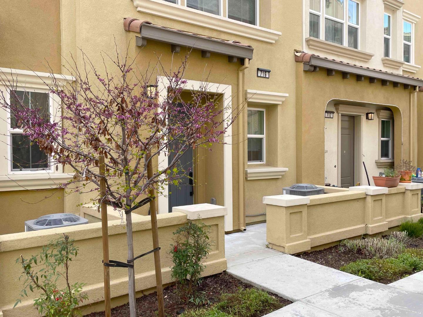 716 Amalfi Loop Milpitas, CA 95035 - Photo 2 of 28 a view of a house with pool and chairs