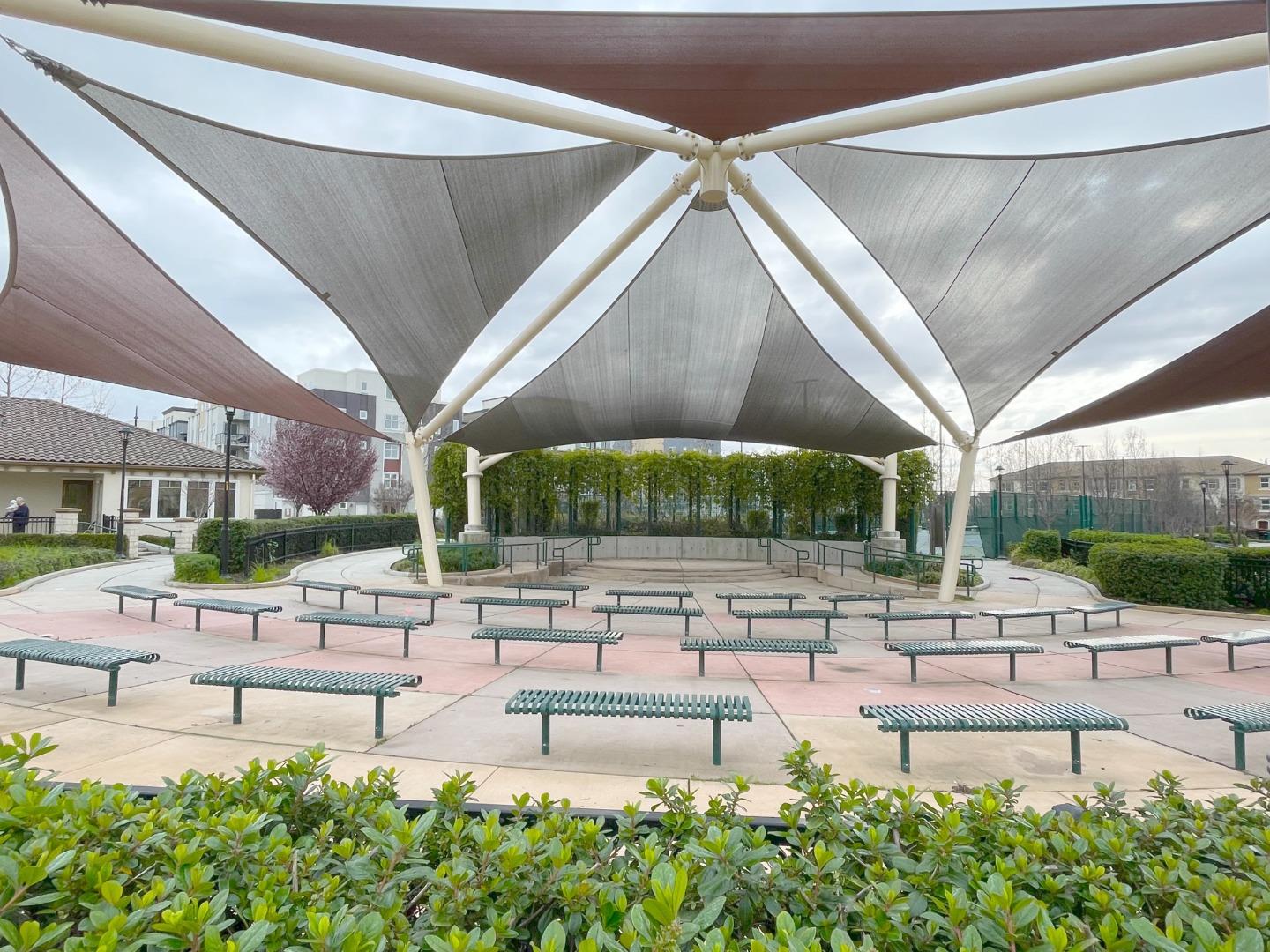 716 Amalfi Loop Milpitas, CA 95035 - Photo 27 of 28 a patio with a table and chairs
