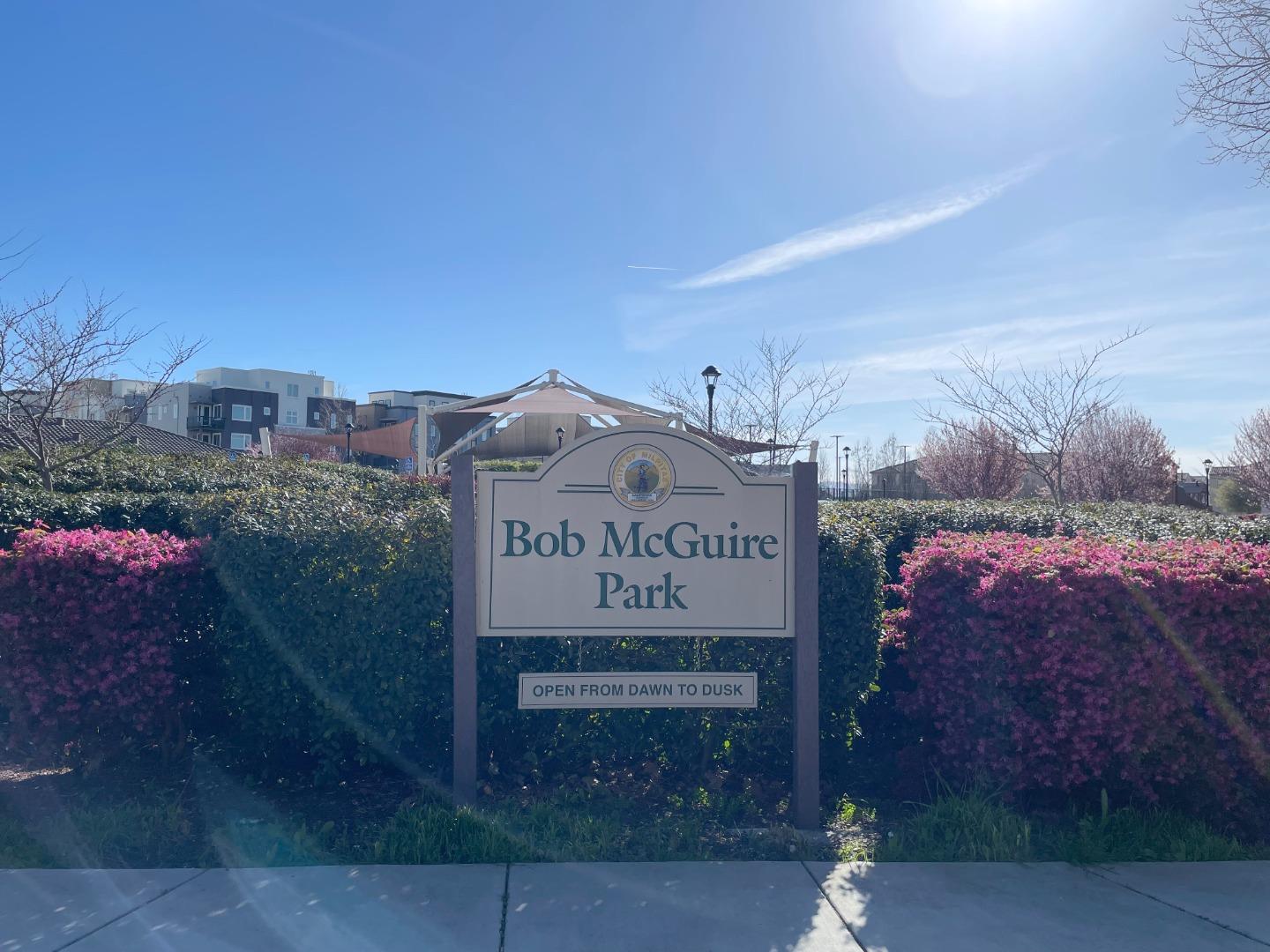 716 Amalfi Loop Milpitas, CA 95035 - Photo 28 of 28 a sign on the side of a road