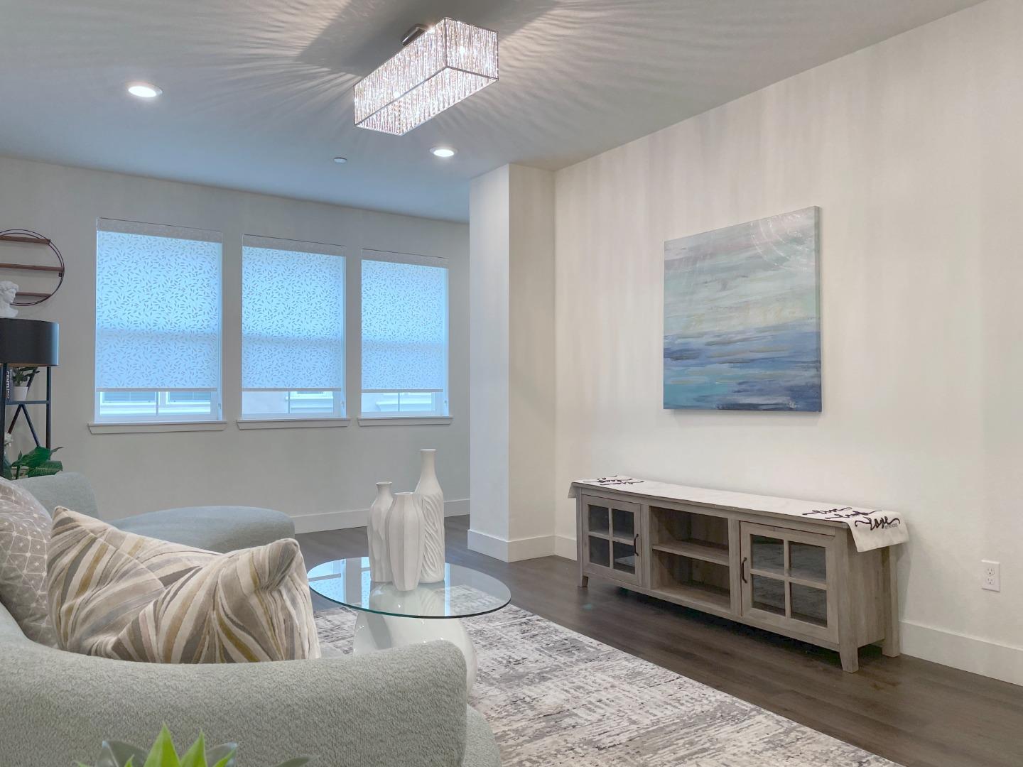 716 Amalfi Loop Milpitas, CA 95035 - Photo 8 of 28 a living room with furniture and a window