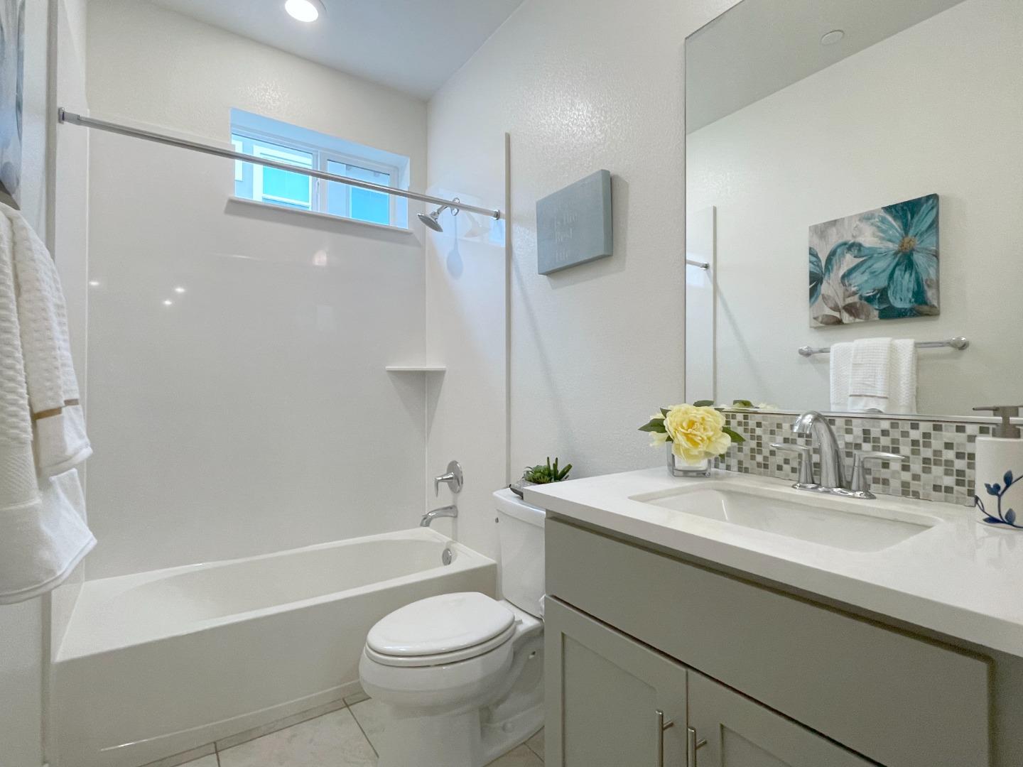716 Amalfi Loop Milpitas, CA 95035 - Photo 10 of 28 a bathroom with a sink toilet and shower