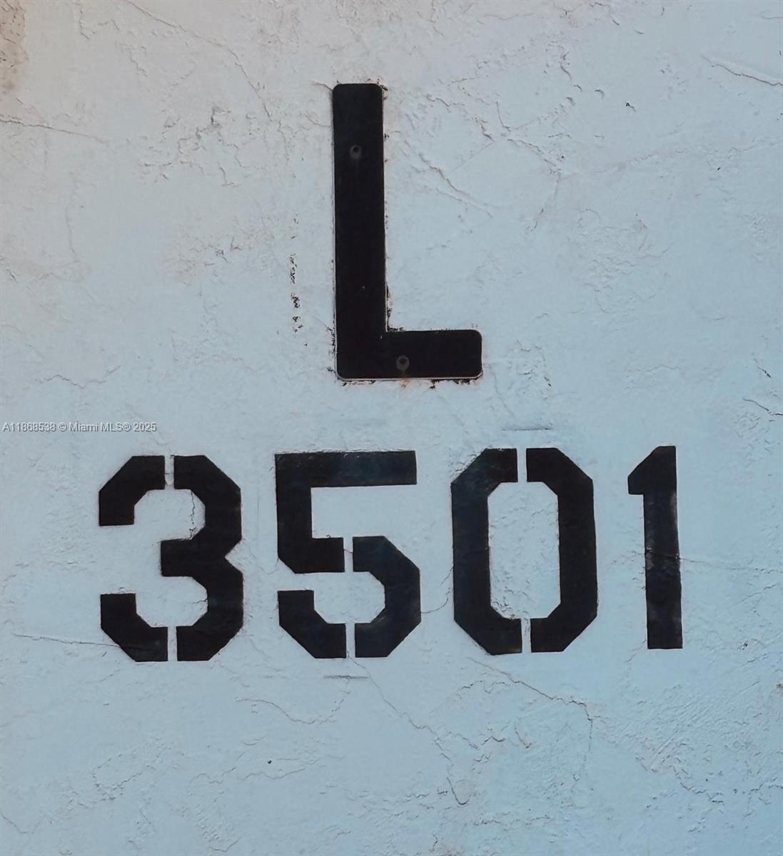 3501 Inverrary Drive, Unit 201 Lauderhill, FL 33319 - Photo 26 of 35 a kitchen with a sink and a stove