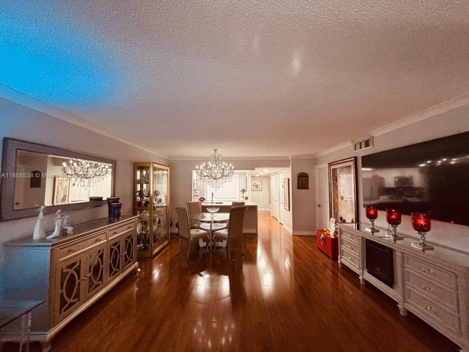 3501 Inverrary Drive, Unit 201 Lauderhill, FL 33319 - Photo 7 of 35 a view of a living room and dining room