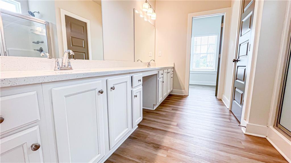 740 Eudora Welty Way Athens, GA 30607 - Photo 26 of 57 a bathroom with double vanity and mirrors