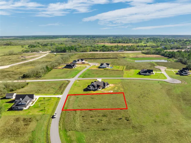 a view of a swimming pool with an ocean and mountain view