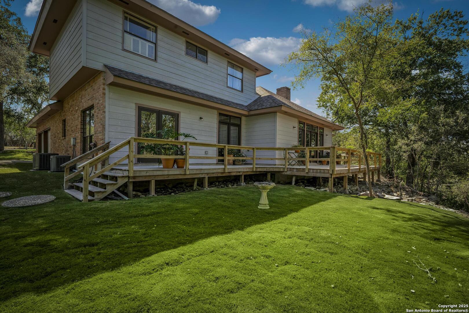 127 Siebeneicher Road Boerne, TX 78006 - Photo 31 of 50 a front view of house with yard and green space