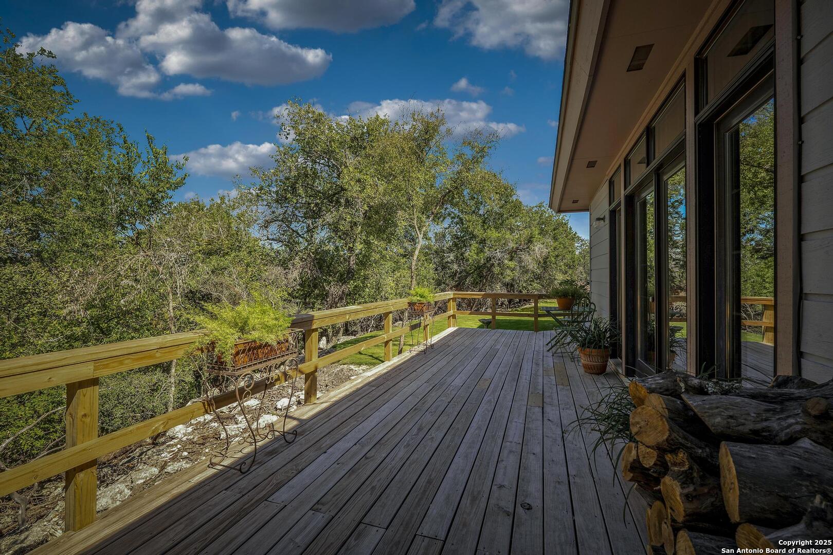 127 Siebeneicher Road Boerne, TX 78006 - Photo 34 of 50 a view of a balcony with wooden floor
