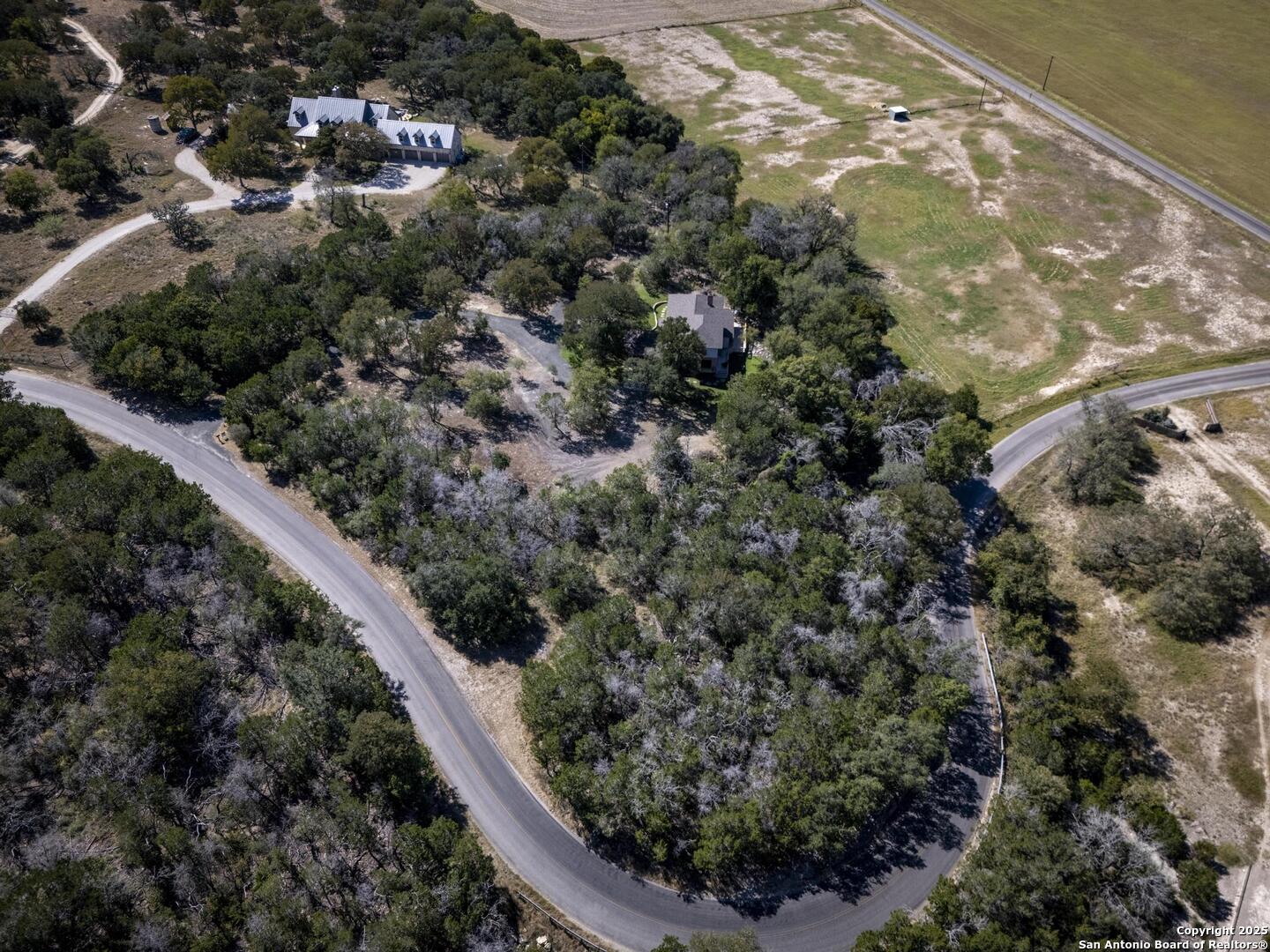 127 Siebeneicher Road Boerne, TX 78006 - Photo 39 of 50 a view of a forest with a street