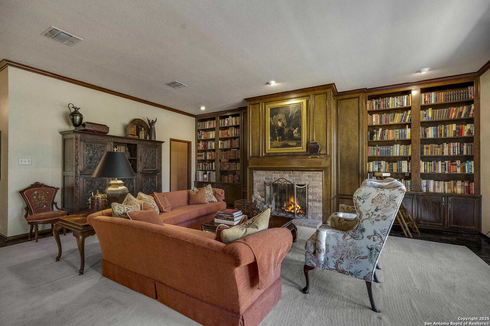 127 Siebeneicher Road Boerne, TX 78006 - Photo 7 of 50 a living room with furniture and a fireplace