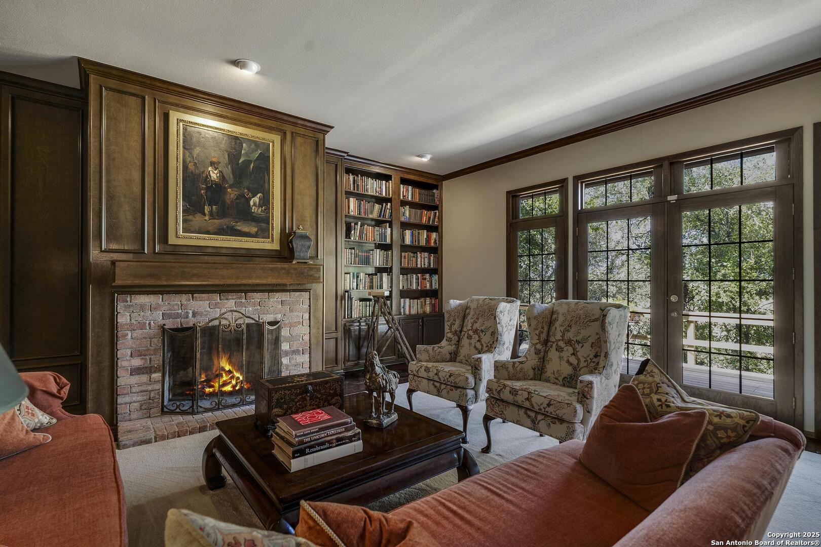 127 Siebeneicher Road Boerne, TX 78006 - Photo 8 of 50 a living room with furniture and a fireplace