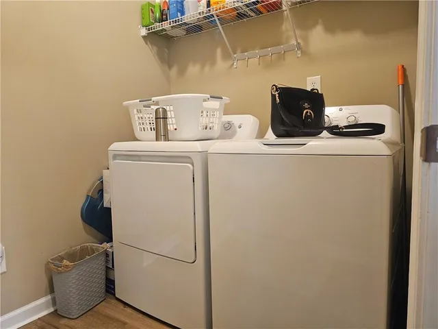 a utility room with dryer and washer