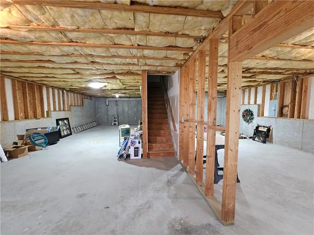 a view of a room with wooden walls