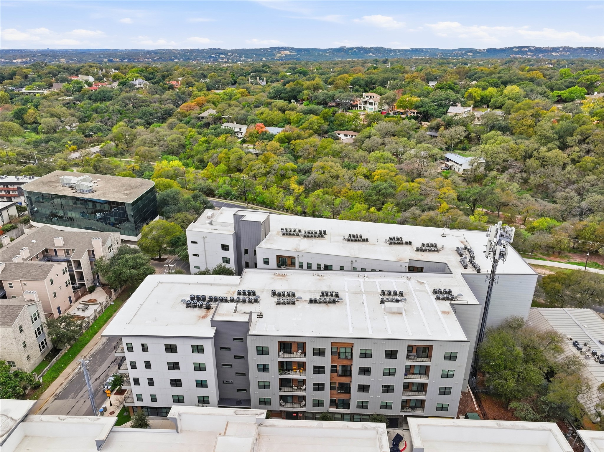 2500 Longview Street, Unit 219 Austin, TX 78705 - Photo 37 of 40 Drone / aerial view of a forest