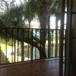 a view of a lake with a house