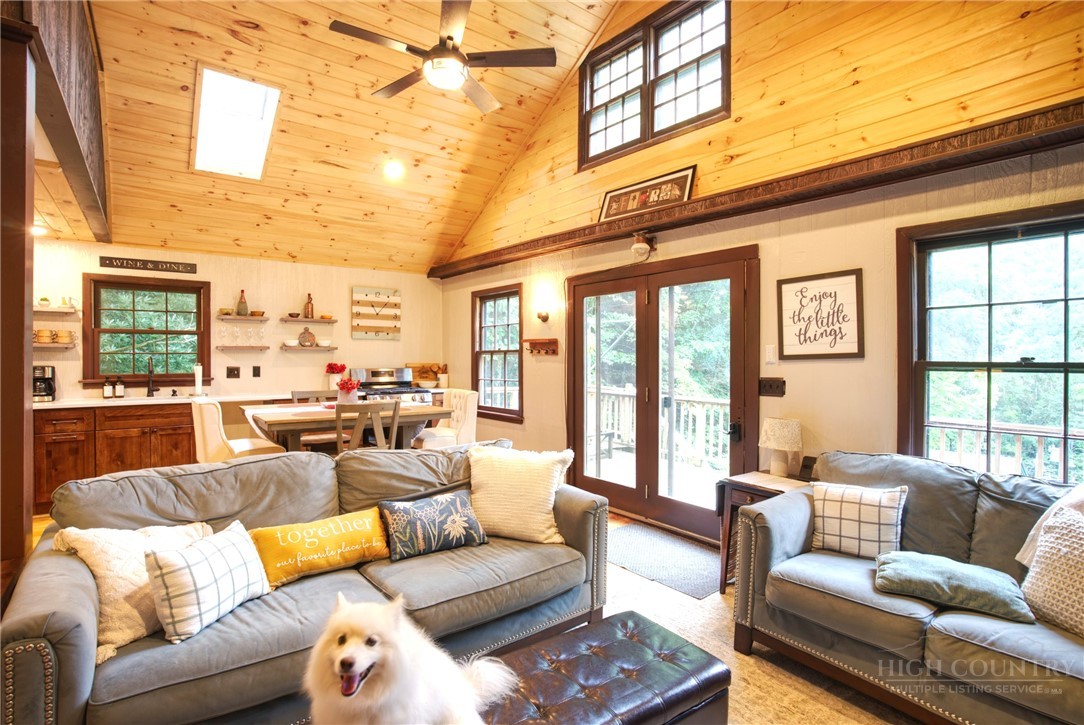 9440 Blackberry Road Lenoir, NC 28645 - Photo 30 of 30 a living room with furniture and a large window