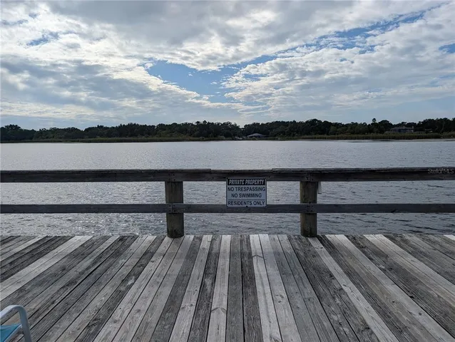 a view of wooden floor and lake