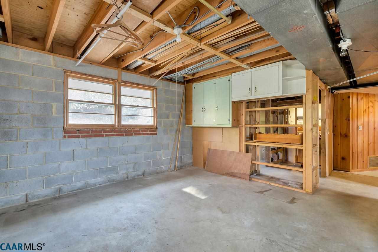 706 McIntire Road Charlottesville, VA 22902 - Photo 16 of 25 With the roughed-in bath, duct work and stud-framing in place, the basement is ready to be fully finished...or continue to utilize the unfinished sq ft as a workshop.