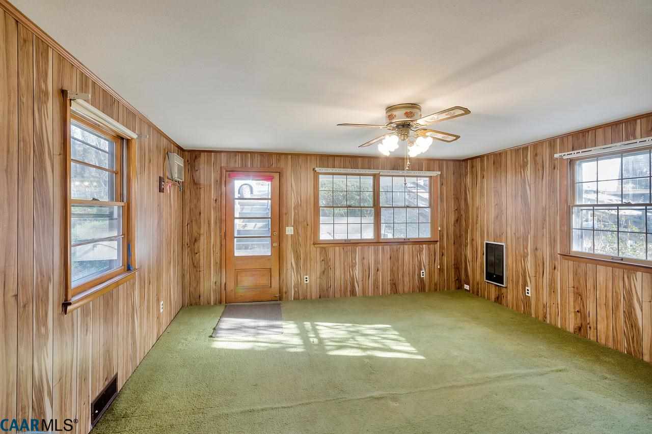 706 McIntire Road Charlottesville, VA 22902 - Photo 6 of 25 Large, cozy family room on the main level was added on for even more entertaining space.