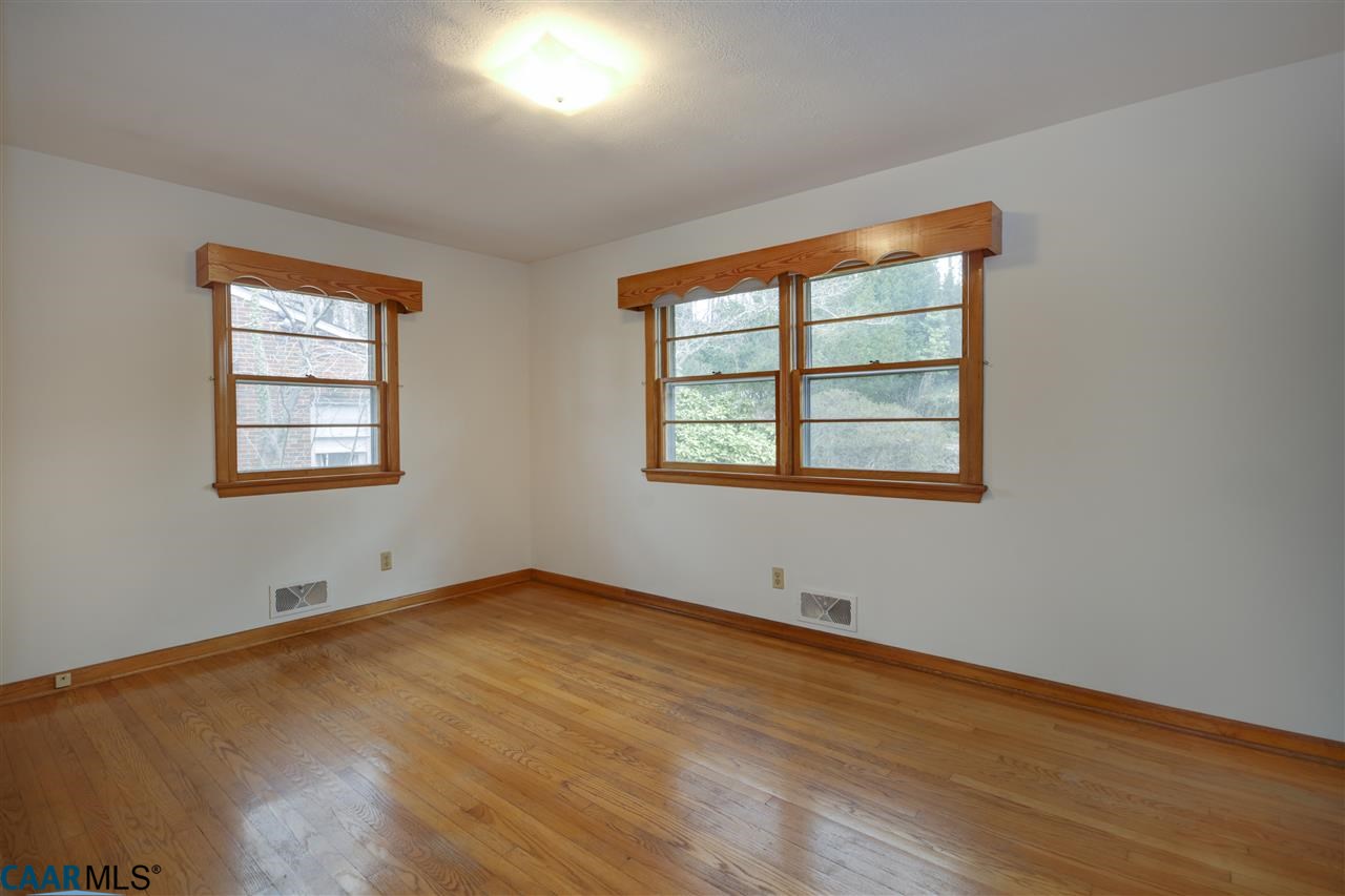 706 McIntire Road Charlottesville, VA 22902 - Photo 8 of 25 Master bedroom with attached full bath overlooks the backyard.