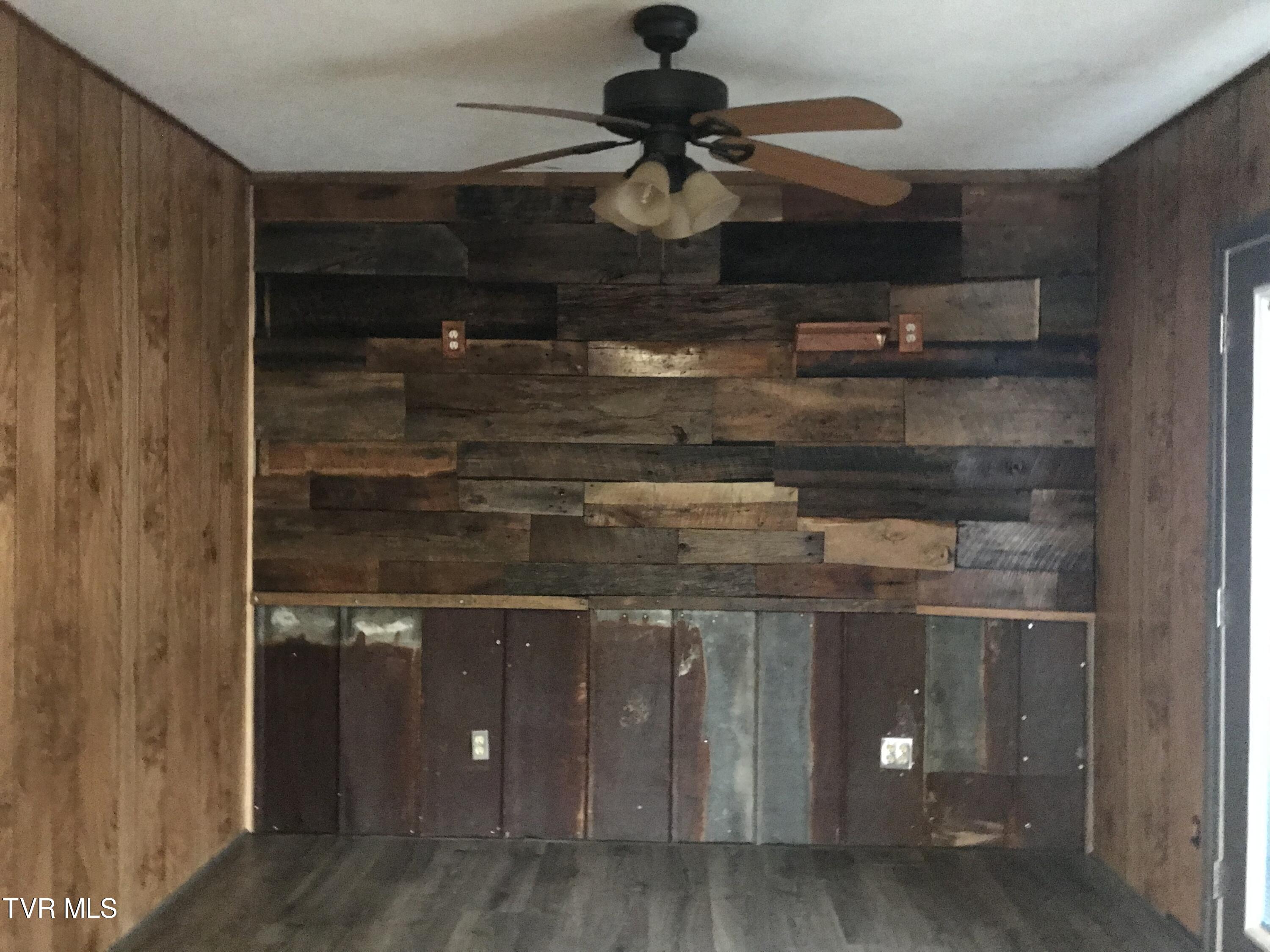 1162 Blue Springs Road Elizabethton, TN 37643 - Photo 11 of 38 BARNWOOD WALL IN DINING AREA