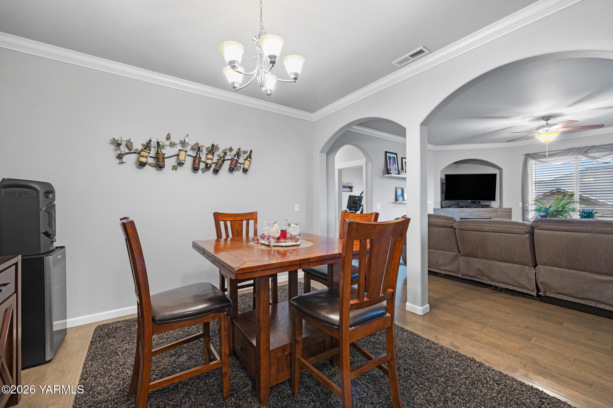 1425 Valhalla Loop Selah, WA 98942 - Photo 8 of 33 a view of a dining room with furniture and wooden floor