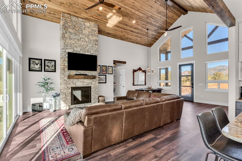 228 Freek Ranch Road Canon City, CO 81212 - Photo 17 of 50 a living room with fireplace furniture and a flat screen tv