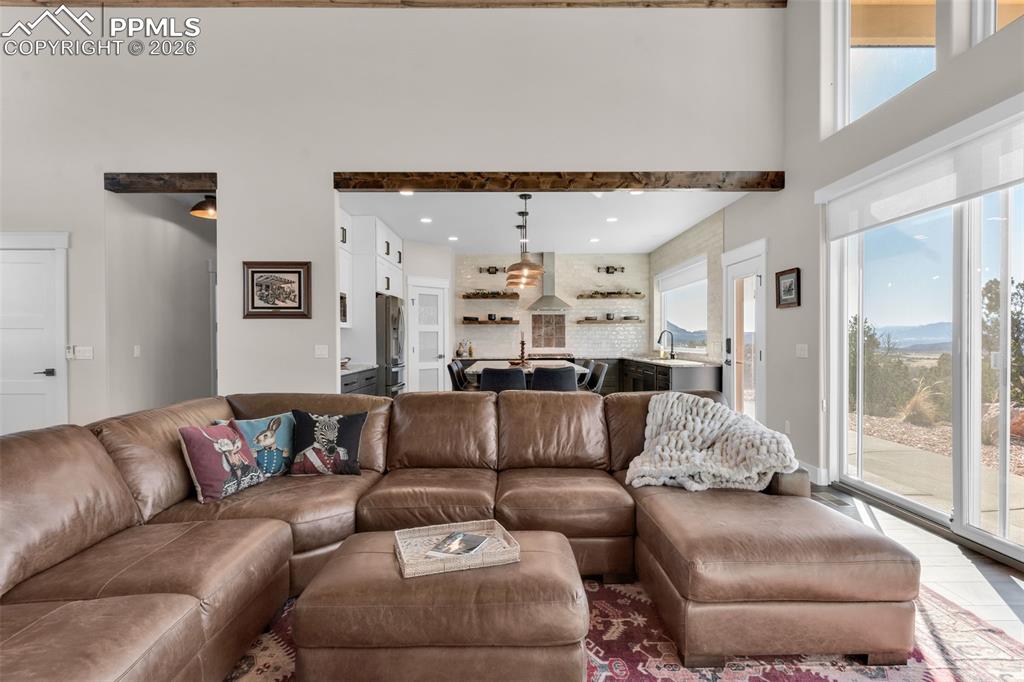 228 Freek Ranch Road Canon City, CO 81212 - Photo 18 of 50 a living room with furniture and a large window