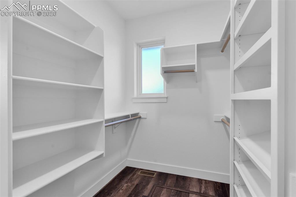 228 Freek Ranch Road Canon City, CO 81212 - Photo 34 of 50 a view of walk in closet with empty racks