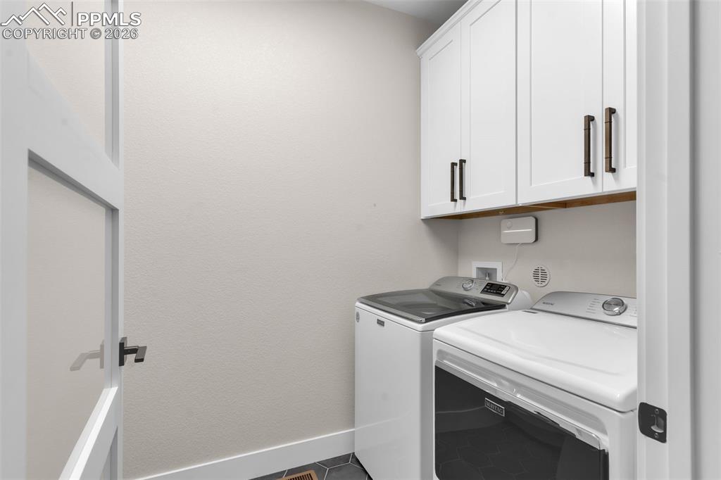 228 Freek Ranch Road Canon City, CO 81212 - Photo 36 of 50 a utility room with dryer and washer