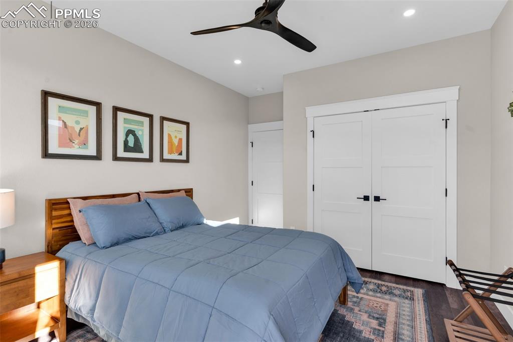 228 Freek Ranch Road Canon City, CO 81212 - Photo 40 of 50 a bedroom with a bed and a window