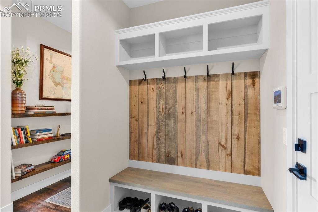 228 Freek Ranch Road Canon City, CO 81212 - Photo 41 of 50 a view of a bedroom with clothes and shoes
