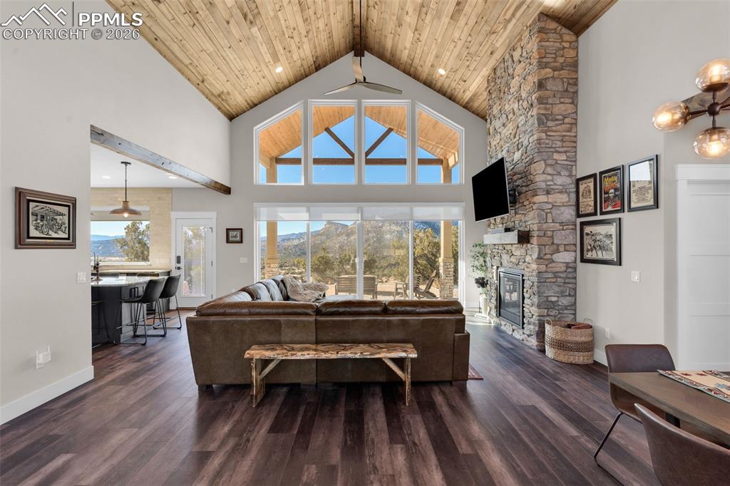 228 Freek Ranch Road Canon City, CO 81212 - Photo 7 of 50 a living room with fireplace furniture and a window