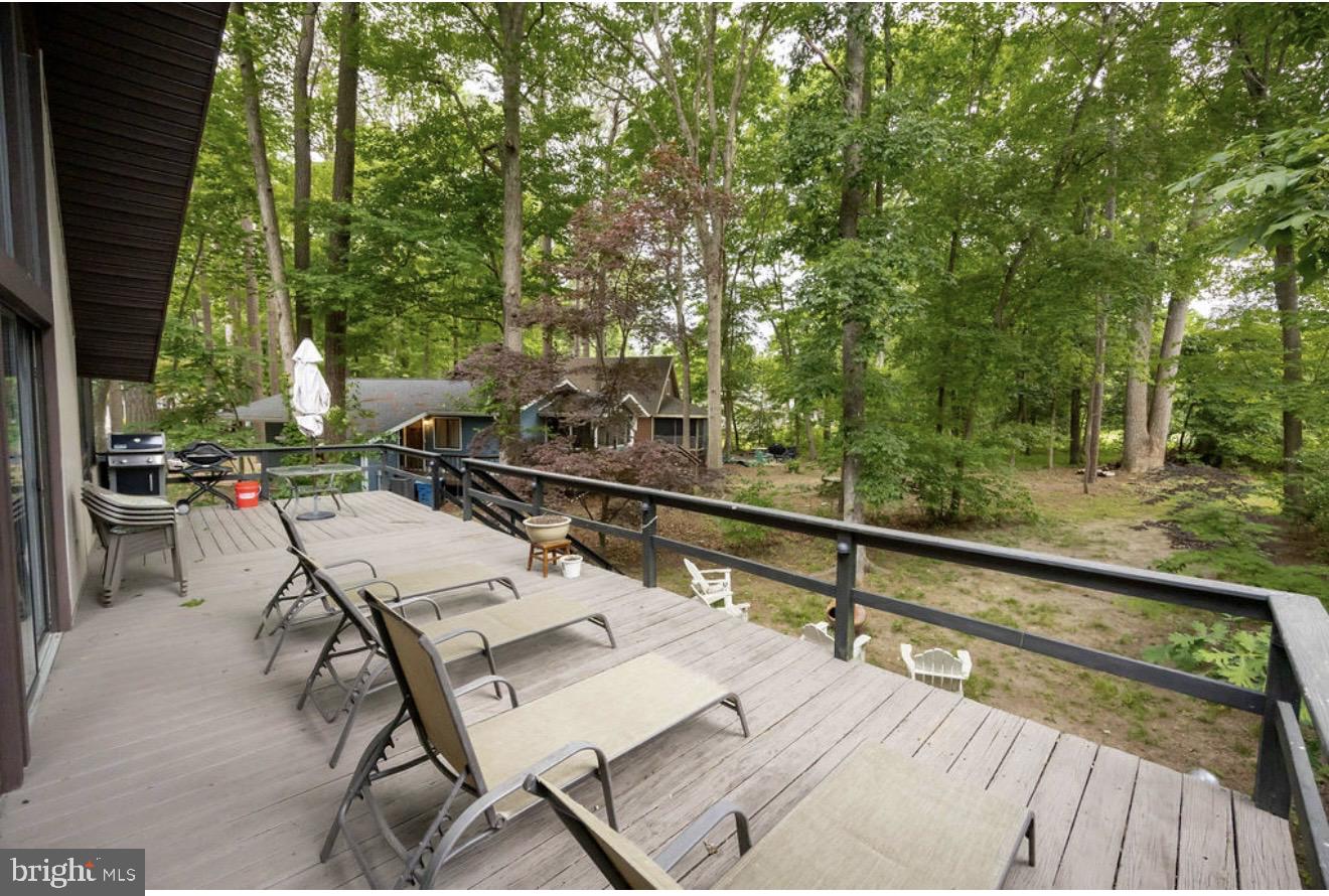 5 Falcon Bridge Road Ocean Pines, MD 21811 - Photo 50 of 59 a view of a patio with wooden floor