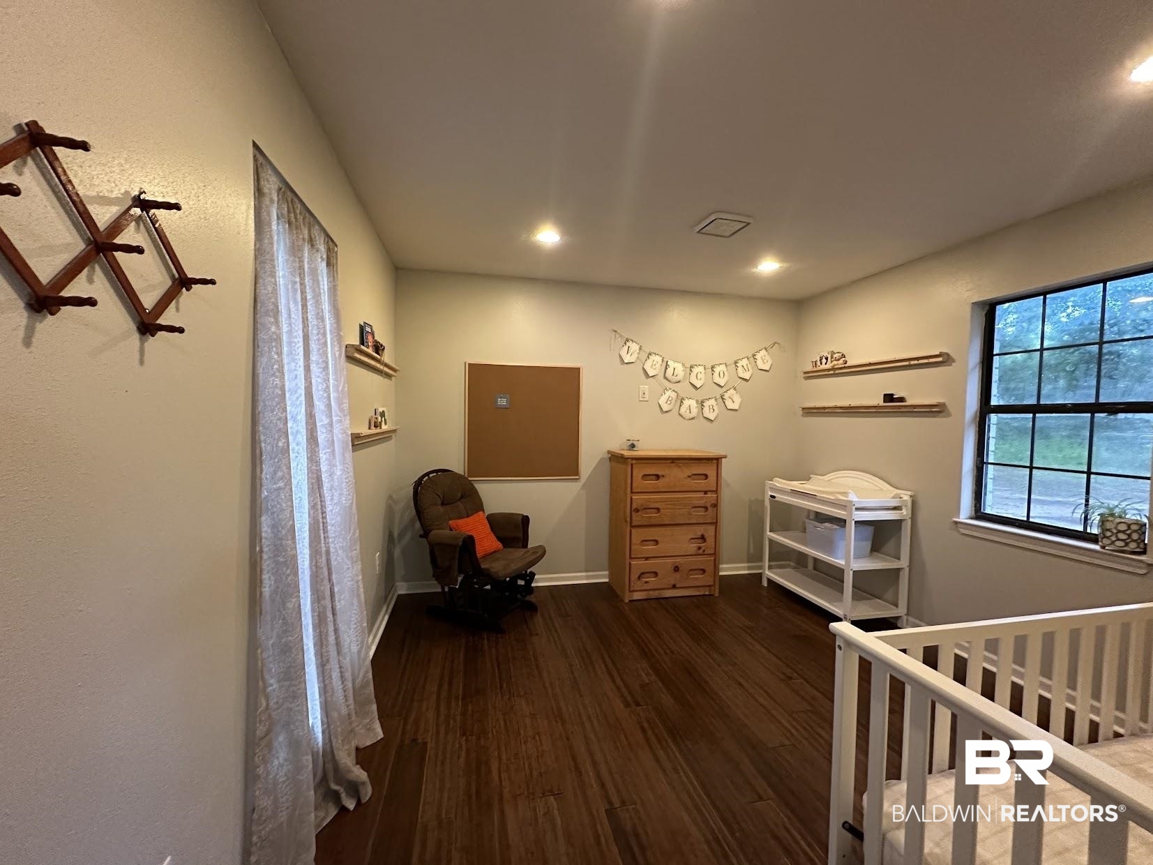 8450 Murray Road Irvington, AL 36544 - Photo 9 of 20 Bedroom with dark hardwood / wood-style floors
