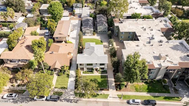 an aerial view of residential house with outdoor space